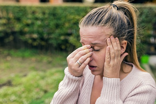 Woman suffering from sinusitis