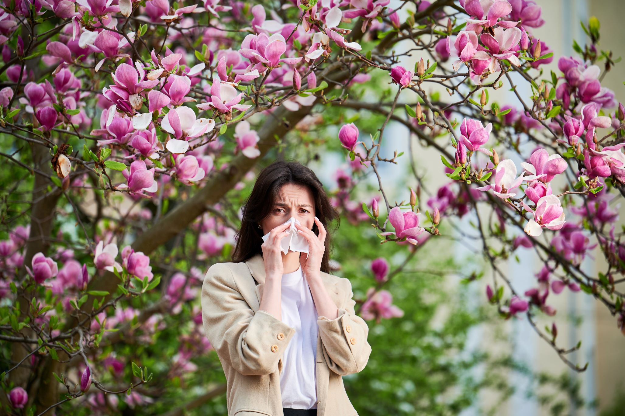 Woman suffering from seasonal allergy.
