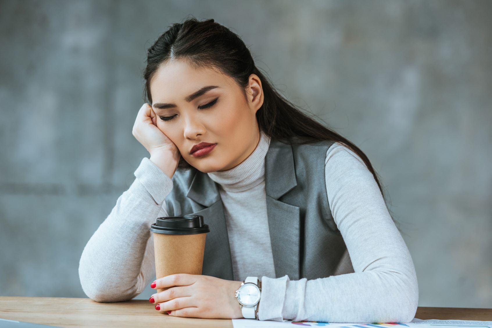 Woman tired due to lack of sleep.